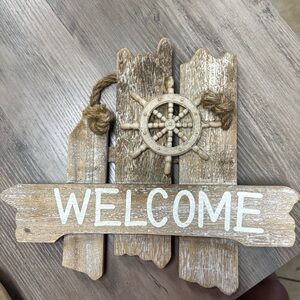 Rustic Welcome Sign with Nautical Wheel